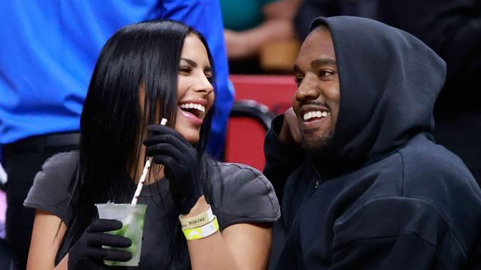Mandatory Credit: Photo by MediaPunch/Shutterstock (12847842e)Rapper Kanye West and girlfriend Chaney Jones attend a game between the Miami Heat and the Minnesota Timberwolves at FTX ArenaCelebrities at Miami Heat v Minnesota Timberwolves, Basketball at FTX Arena, Miami, Florida, USA - 12 Mar 2022.