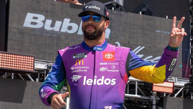 Mandatory Credit: Photo by Suzanne Cordeiro/Shutterstock (12869969ai)Bubba Wallace, driver of the #23 leidos Toyota, waves to fans onstage during driver intros prior to the NASCAR Cup Series Echopark Automotive Grand Prix at Circuit of The Americas on March 27, 2022 in Austin, Texas.