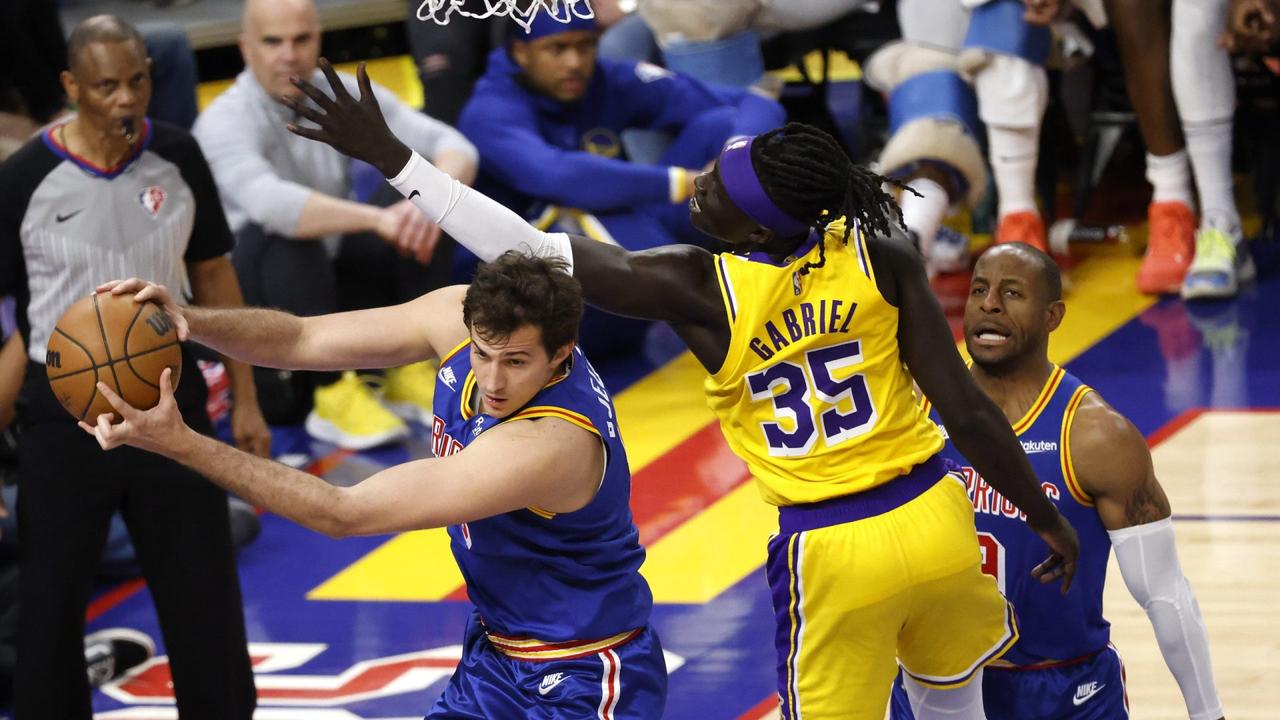 SHUTTERSTOCK OUTMandatory Credit: Photo by JOHN G MABANGLO/EPA-EFE/Shutterstock (12886527i)Golden State Warriors forward Nemanja Bjelica (L) grabs a rebound ahead of Los Angeles Lakers forward Wenyen Gabriel (C) during the second half of their NBA game at Chase Center in San Francisco, California, USA, 07 April 2022.