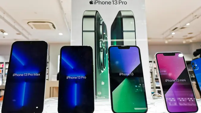 Mandatory Credit: Photo by Beata Zawrzel/NurPhoto/Shutterstock (12965064h)iIhone 13 Pro Max, iPhone 13 Pro, iPhone 13 and iPhone 13 mini are seen inside ISpot store in Galeria Krakowska shopping mall in Krakow, Poland on May 30, 2022.