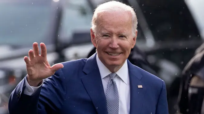 Mandatory Credit: Photo by MICHAEL REYNOLDS/EPA-EFE/Shutterstock (12985511b)US President Joe Biden waves while walking across the South Lawn to depart the White House by Marine One, en route to Philadelphia, in Washington, DC, USA, 14 June 2022.