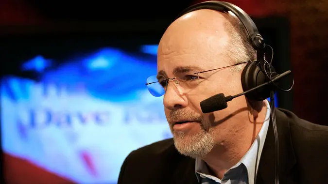 Mandatory Credit: Photo Credit: Mark Humphrey/AP/Shutterstock (6378435g) Dave Ramsey Financial Talk Show Host Dave Ramsey works at a broadcast studio in Brentwood, Tennessee.