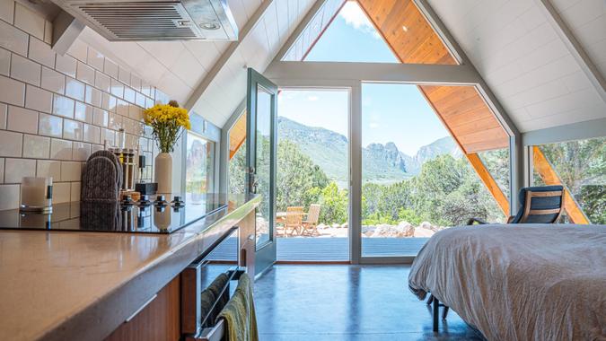 With 400 square feet of polished concrete floors, this Triangular Tiny Home in Colorado is the perfect one-of-a-kind vacation rental getaway for travelers.