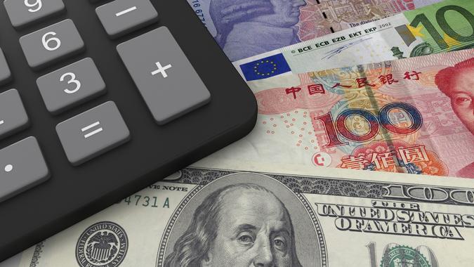 Global money currency exchange loan calculator stock photo