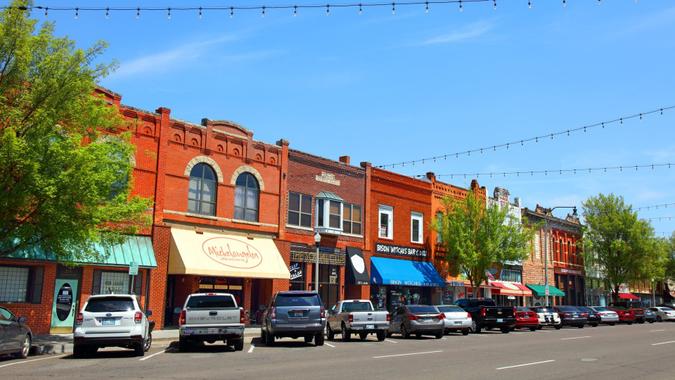 Norman, Oklahoma, USA - April 24, 2018: Daytime view of the quaint and historic Main Street in the downtown district in the third-largest city in Oklahoma.