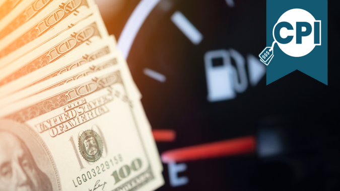 Dollar bank money coming from car fuel mileage dashboard concept closed on financial background.