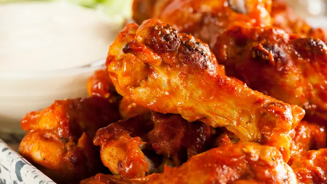 Hot and Spicey Buffalo Chicken Wings with celery.