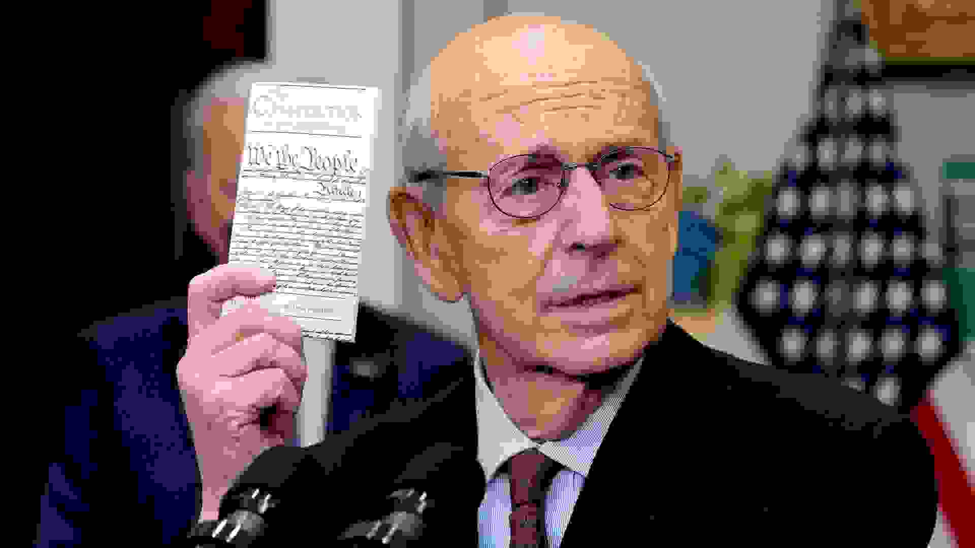Mandatory Credit: Photo by Andrew Harnik/AP/Shutterstock (12778732aa)Supreme Court Associate Justice Stephen Breyer holds up a copy of the United States Constitution as he announces his retirement in the Roosevelt Room of the White House in WashingtonBiden, Washington, United States - 27 Jan 2022.