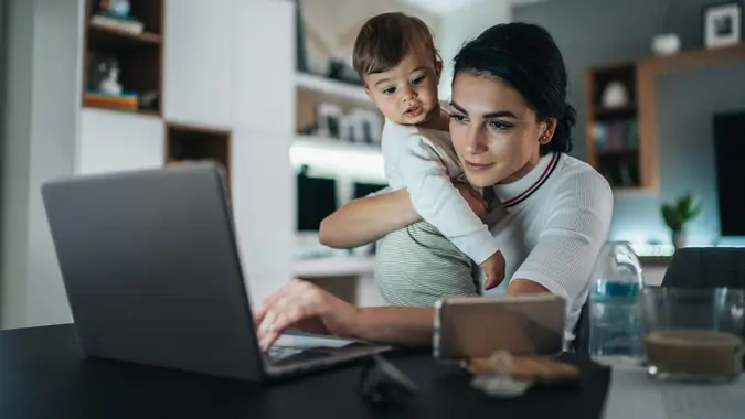Working at home mom stock photo