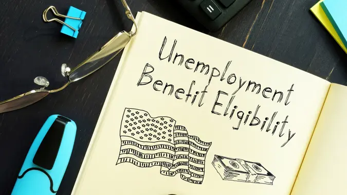 Unemployment Benefit Eligibility is shown on a business photo using the text.