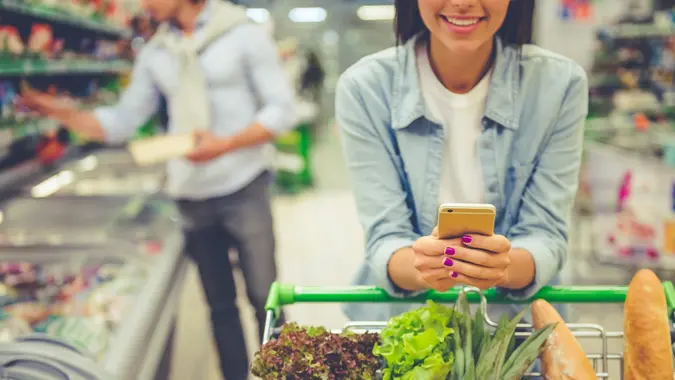 Couple in the supermarket stock photo