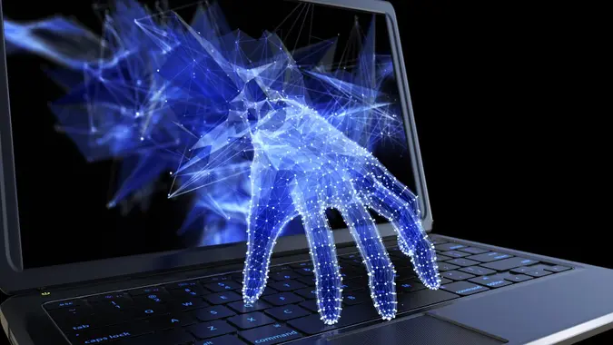 Stealing personal data through laptop concept Stock Photo