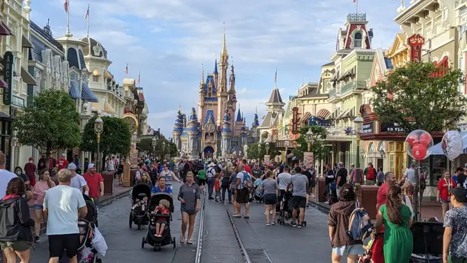 Visitors on Main Street, Magic Kingdom,  Walt Disney World, Orlando, Florida.