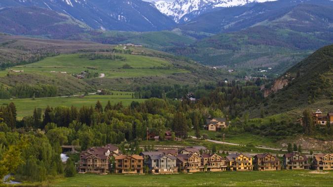 Homes in front of Lake Creek View Of Sawatch Range in Edwards Colorado with copy-space.