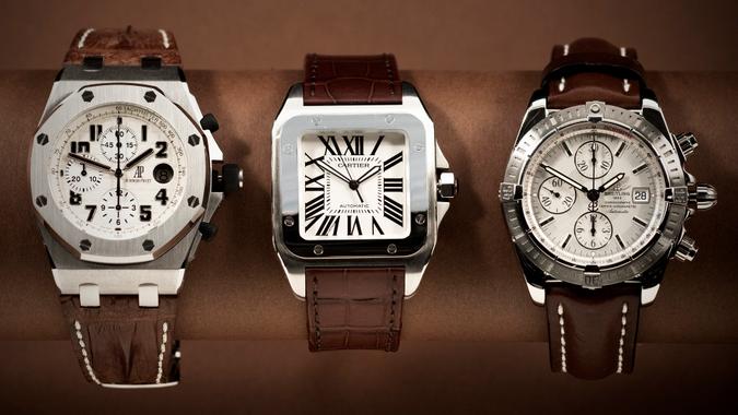 Amsterdam, Netherlands - March 3, 2009: Three luxury watches in a row.