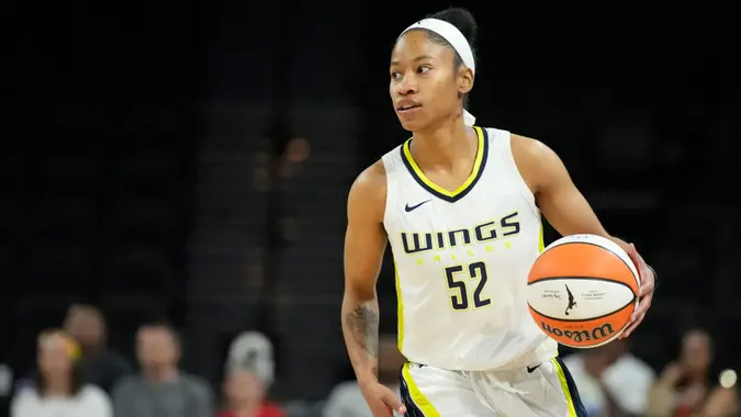 Mandatory Credit: Photo by John Locher/AP/Shutterstock (12976178s)Dallas Wings' Tyasha Harris (52) plays against the Las Vegas Aces during an WNBA basketball game, in Las VegasWings Aces Basketball, Las Vegas, United States - 05 Jun 2022.