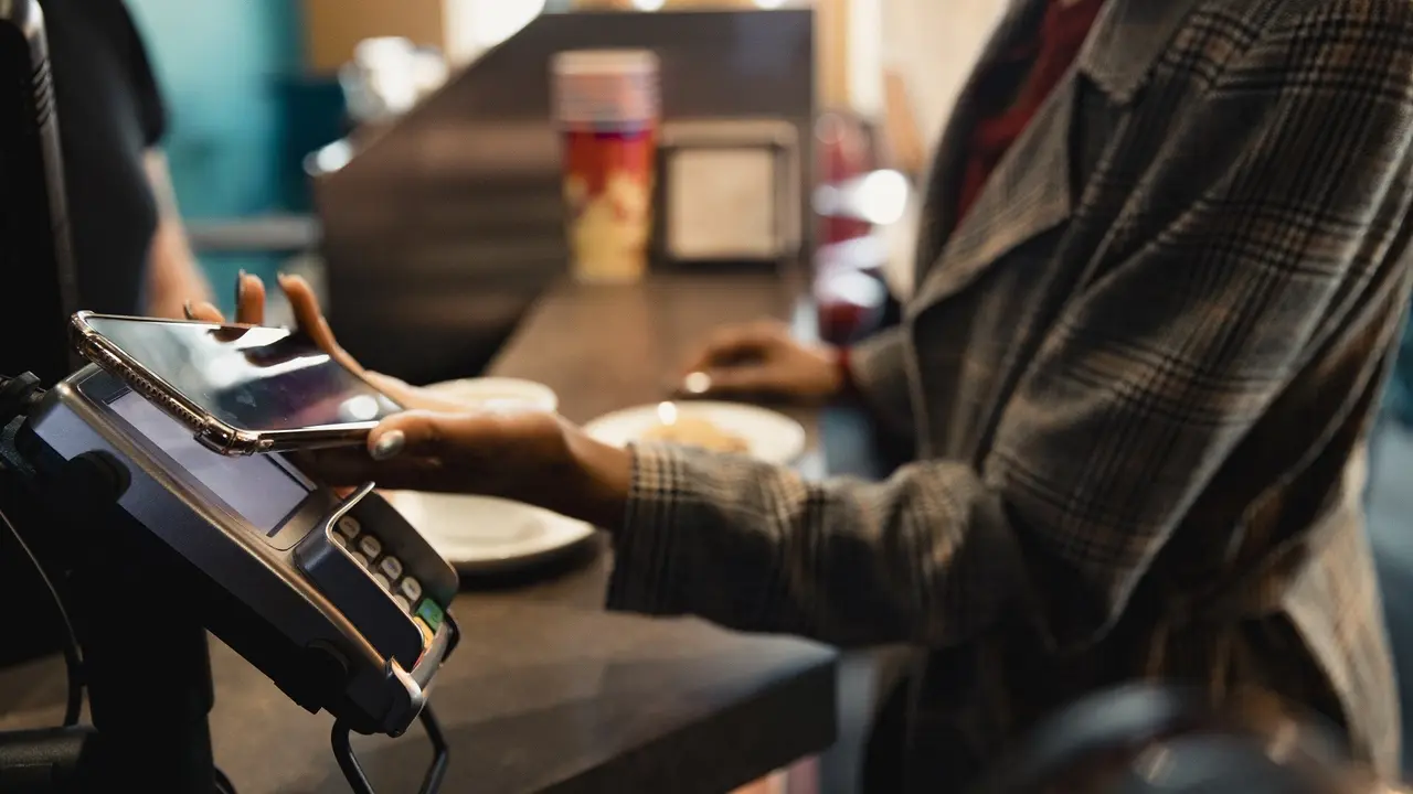 Using Contactless to Pay stock photo