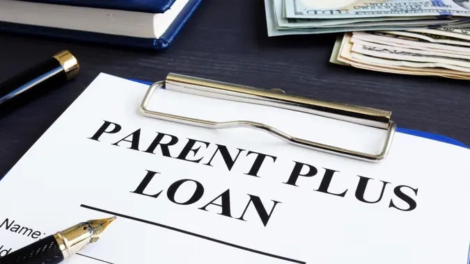 Parent plus loan form and documents in the office.