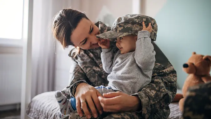 One young woman, soldier, returns from military service and meeting her baby boy after a long time.