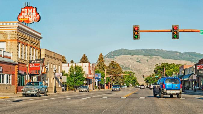 Cody, Wyoming, USA - July 19, 2016: This is Cody Wyoming and this main street view show many of the shops and restaurants along this highway road that  ultimately passes right through the community, Cody is not one of the smaller towns in Wyoming, Cody was named after Buffalo Bill and his partisapation in the development of the area.