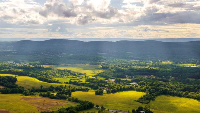 Sun rays over Vernon, New Jersey landscape viewed from Pinwheel Vista.