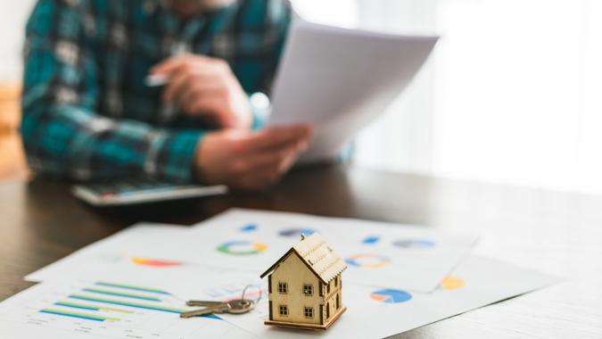Signing a house sale agreement stock photo