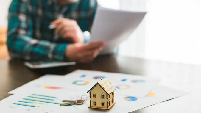 Signing a house sale agreement stock photo