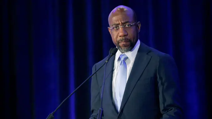 Mandatory Credit: Photo by Akili-Casundria Ramsess/AP/Shutterstock (12950382i)Raphael Warnock speaks at the Gwinnett County Democratic Party fundraiser on in Norcross, GaUS Election 2022 Georgia, Norcross, United States - 21 May 2022.