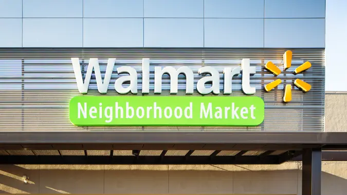 Walmart Neighborhood market store entrance facade with sign stock photo