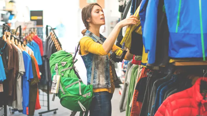 Woman shopping in outdoor equipment mega store stock photo