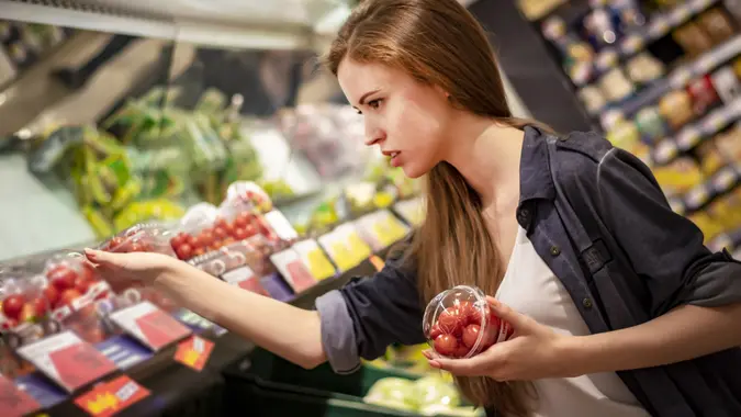 Woman in the Supermarket stock photo