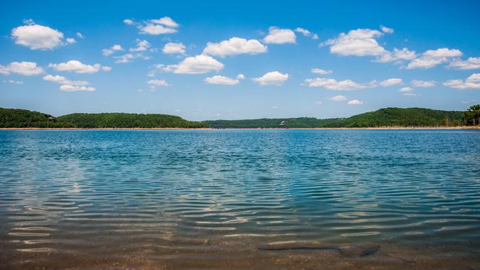 Arkansas Paradise Lake Reflection , ripples on the lake , low angle near water.