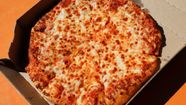 Slice Of Dominos Cheese Pizza