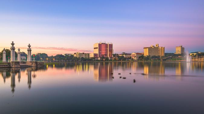 Lakeland, Florida, USA downtown cityscape on the lake at twilight.