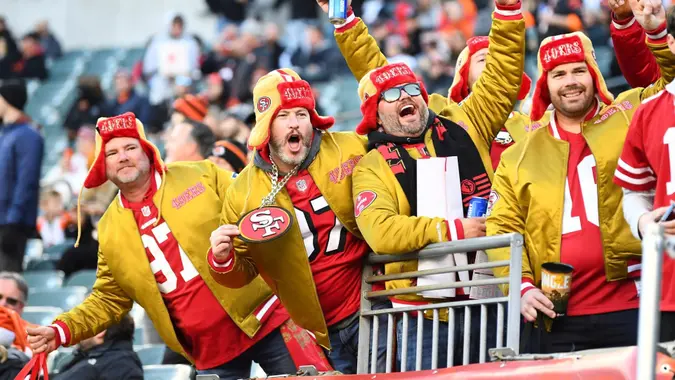Mandatory Credit: Photo by Emilee Chinn/AP/Shutterstock (12644432x)San Francisco 49ers fans react before an NFL football game against the Cincinnati Bengals, in Cincinnati49ers Bengals Football, Cincinnati, United States - 12 Dec 2021.