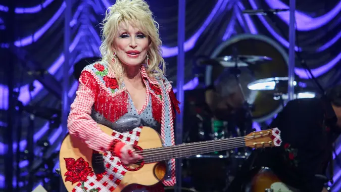 Mandatory Credit: Photo by Jack Plunkett/Invision/AP/Shutterstock (12857729x)Dolly Parton performs at Austin City Limits Live for Blockchain Creative Labs' Dollyverse event during the South by Southwest Music Festival, in Austin, Texas2022 SXSW - Dolly Parton, Austin, United States - 18 Mar 2022.