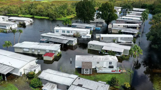 Mandatory Credit: Photo by Paul Hennessy/SOPA Images/Shutterstock (13439000b)(EDITORS NOTE: Image taken with drone) The Jade Isle Mobile Home Park is seen flooded in this aerial view from a drone in St.