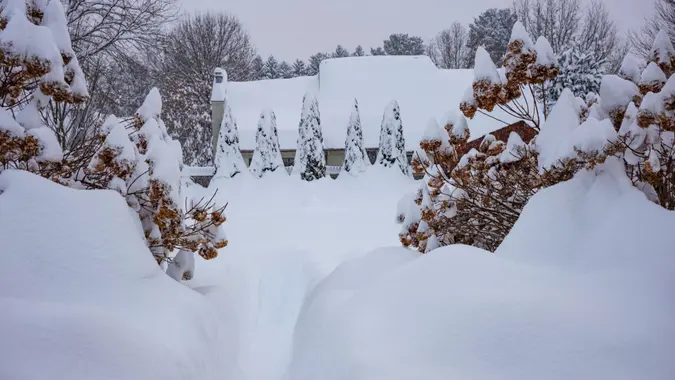 A backyard buried in snow after a winter blizzard dropped over 40-inches overnight in a sleepy upstate New York town.