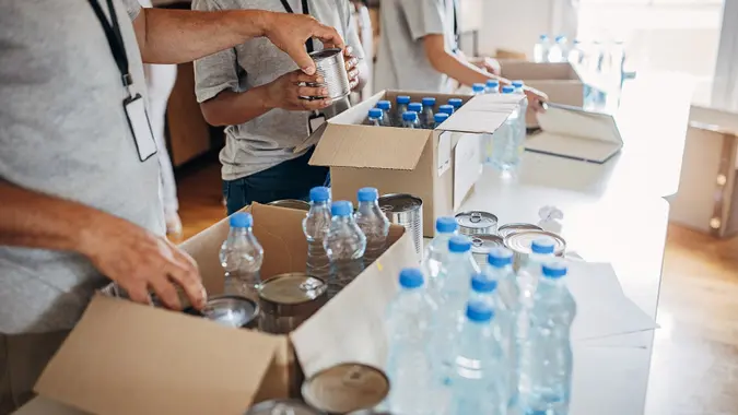 People working for charity together stock photo