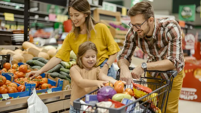 Family in Supermarket stock photo