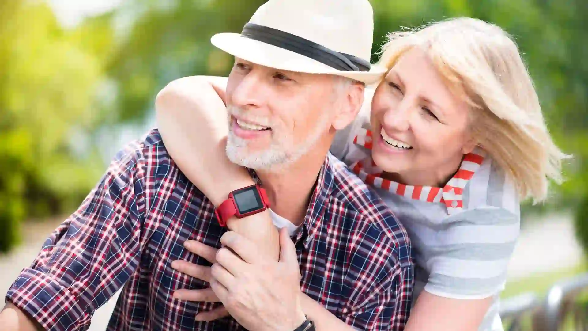 Aged couple enjoying each other stock photo