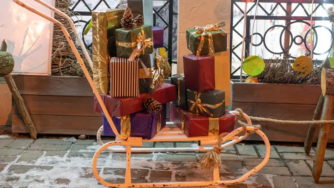 A sleigh with gift boxes.
