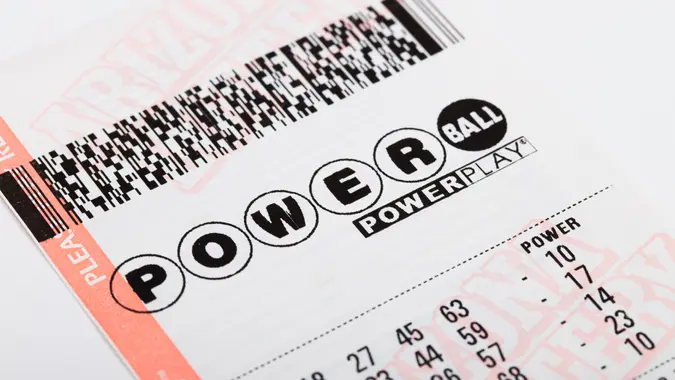 Kingman, USA - January 20, 2016: A photo a Powerball lottery ticket isolated on a white background.