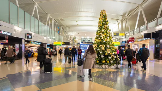 Christmas tree and holiday decorations in terminal 4 at the John F. Kennedy International Airport or JFK stock photo
