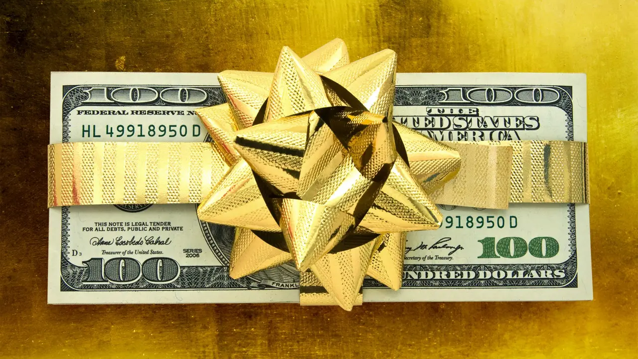 Christmas money on gold.