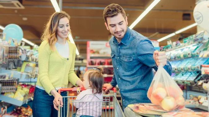 Family In Grocery Store stock photo