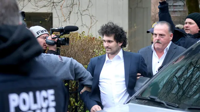 Mandatory Credit: Photo by Guerin Charles/ABACA/Shutterstock (13682403q)FTX founder Sam Bankman-Fried leaves the Federal Court in New York after he was released on a $250 million bond and ordered to detention in his parent's California home on December 22, 2022.