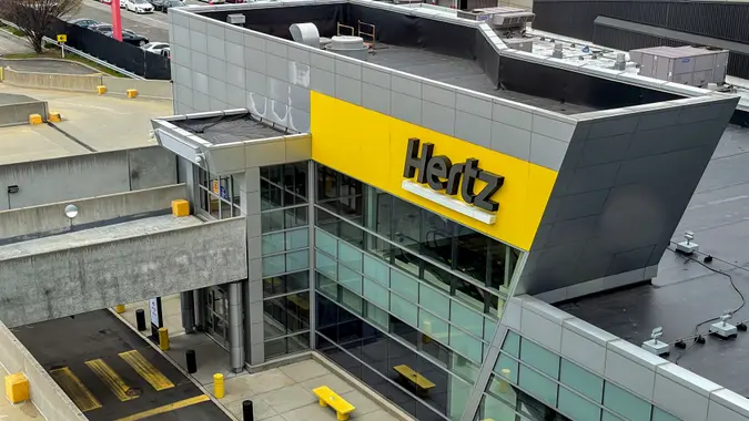 New York, 4-16-2021: The front of the Hertz car rental location at the JFK airport.