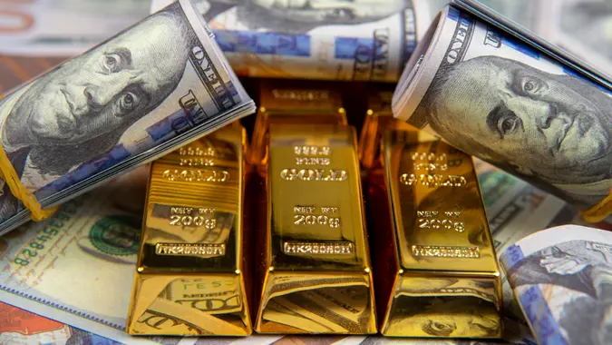 American currency Dollar and Gold ingot combinations.
