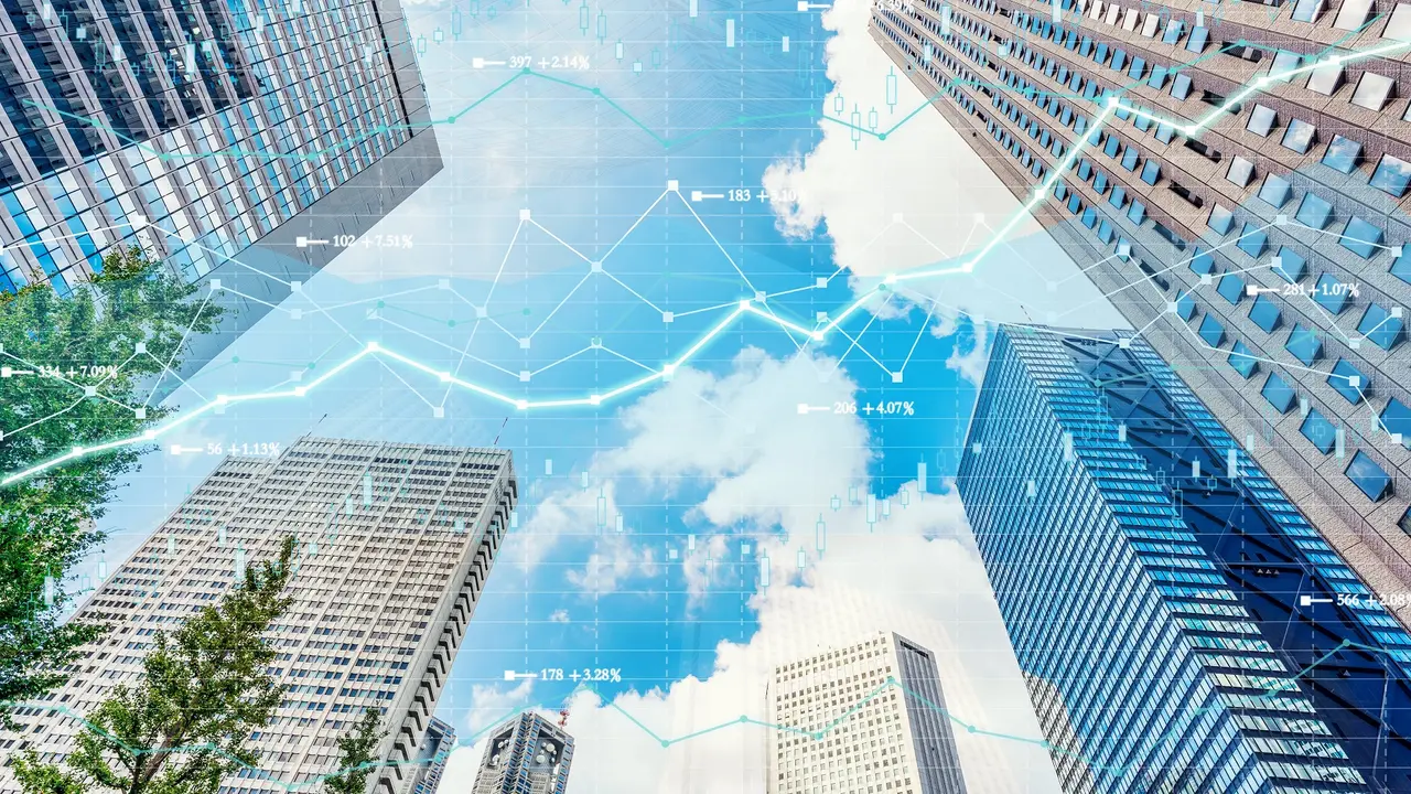 Cityscape Tokyo with investment theme background and stock market chart stock photo